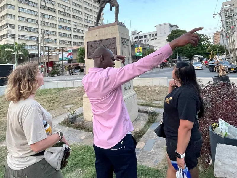 Local guide pointing out landmarks on the Old Town walking tour